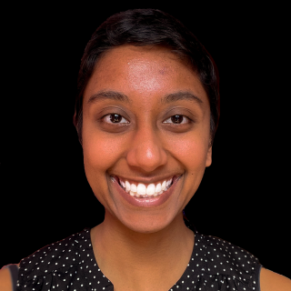 A photograph of Divya Persaud on a black background